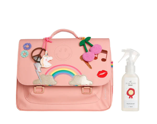 taskerens spray ved siden af skoletaske