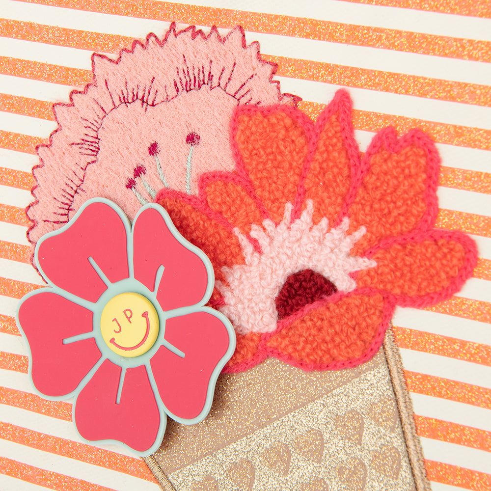 guldfarvet og stribet taske